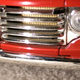 The grille isn’t a solid piece and you can see the brass radiator through the grille.